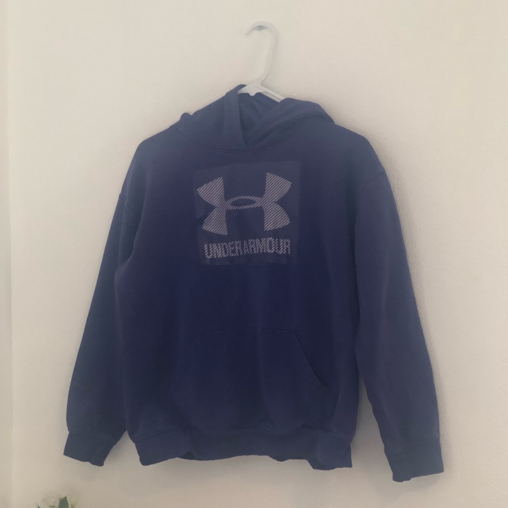 A purple under armor sweatshirt